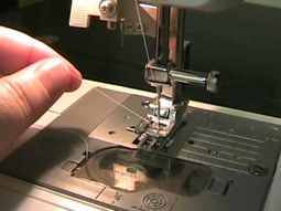 Sewing machine needle not catching the bobbin thread