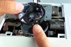 Bobbin-Case-Stuck-in-Sewing-Machine