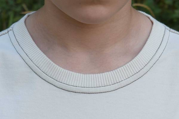 Adini 100% cotton slub jersey T shirt tab and button to cuff twisted neck rib