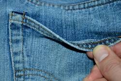 Removing-Stitches-From-Levis-Back-Pockets